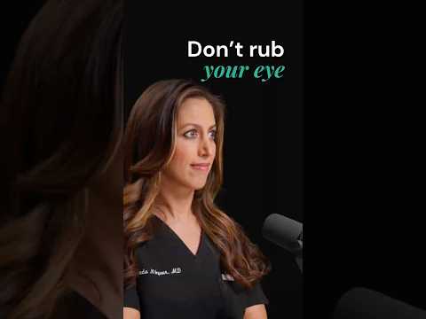 Female ophthalmologist explaining why you shouldn't rub your eye after cataract surgery
